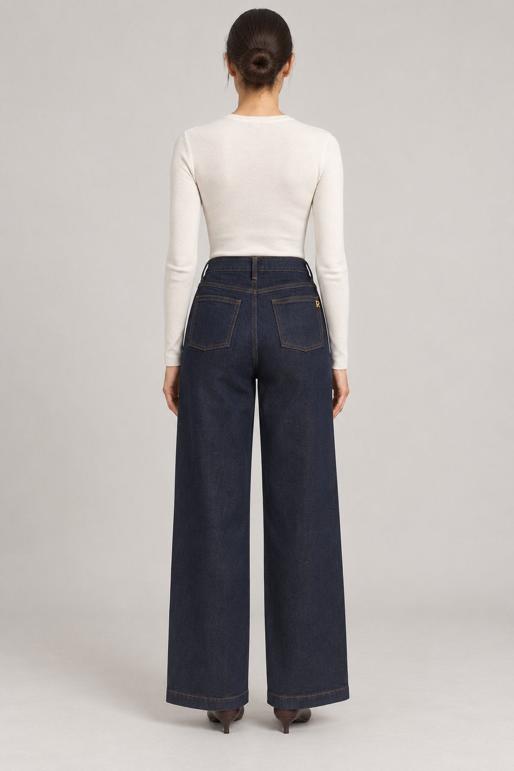 Jeans palazzo con bottoni dorati blu scuro