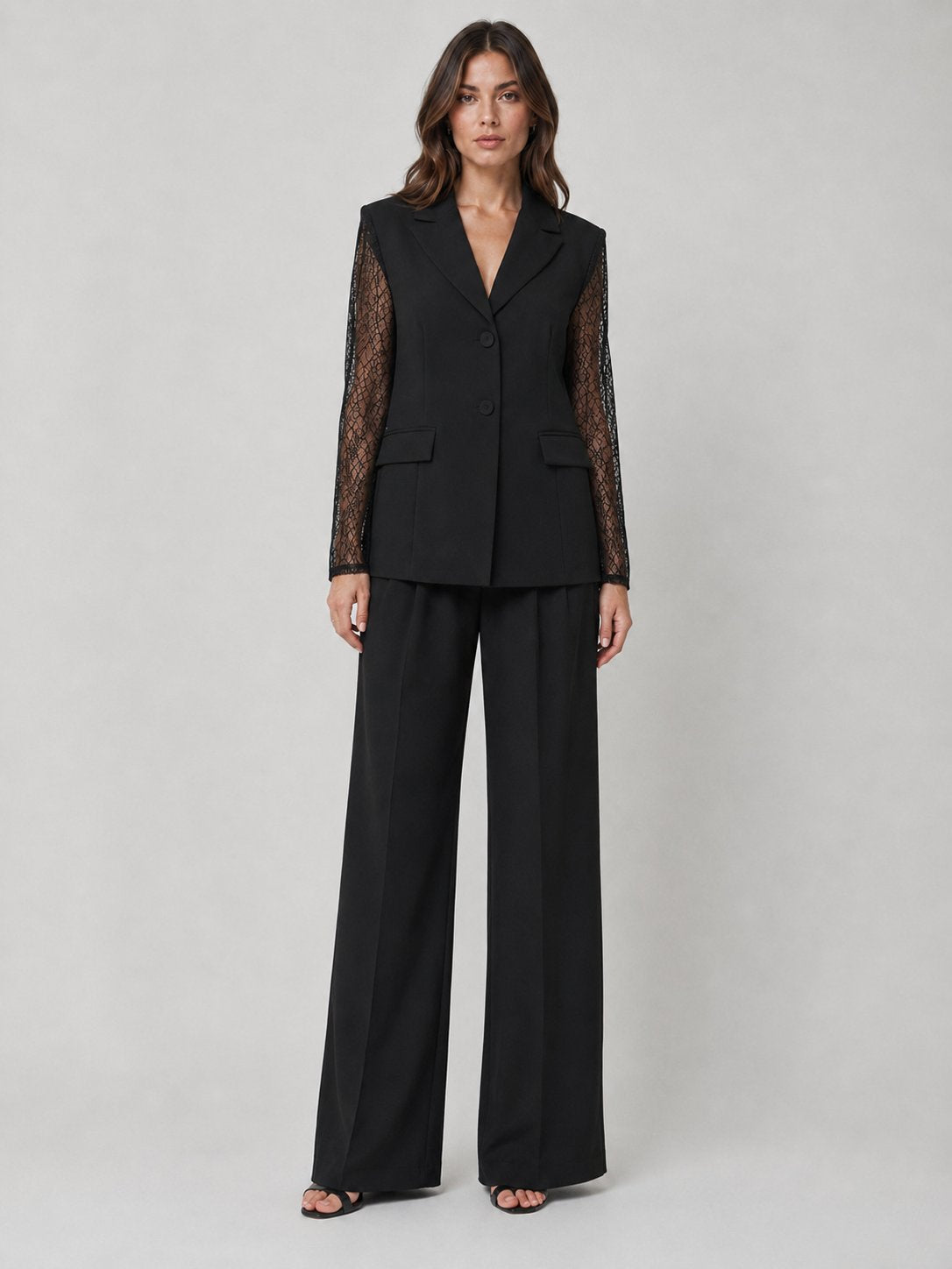 Pantalone palazzo con pizzo nero