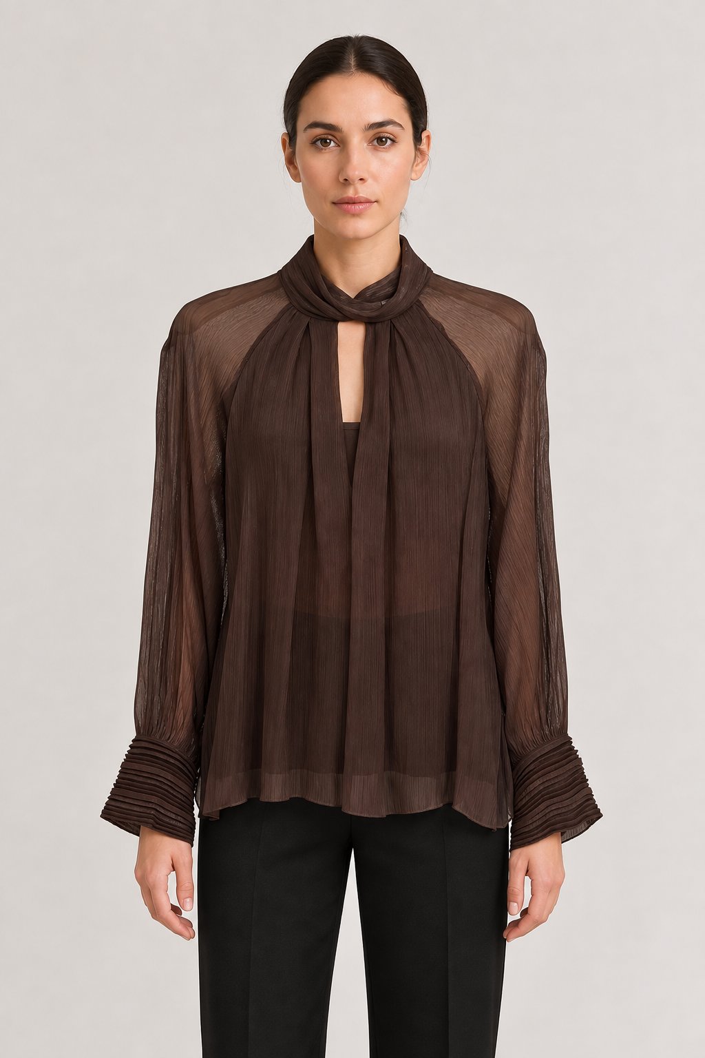Blusa marrone con polsini plissettati