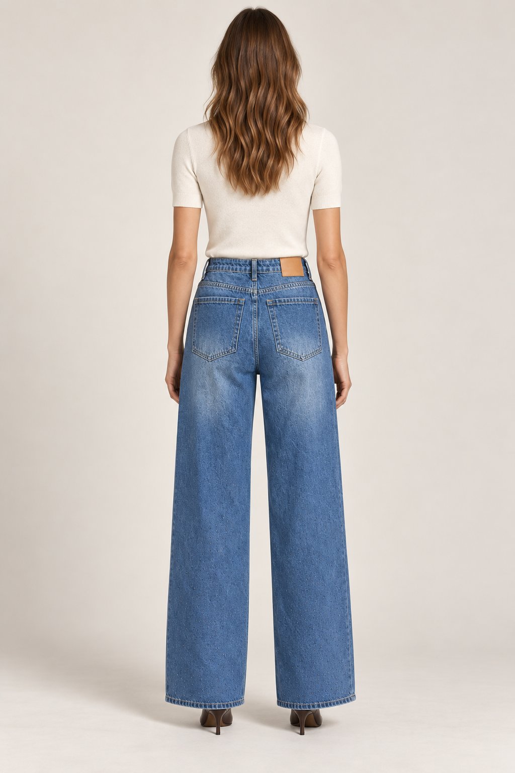 Jeans palazzo con strass azzurro denim