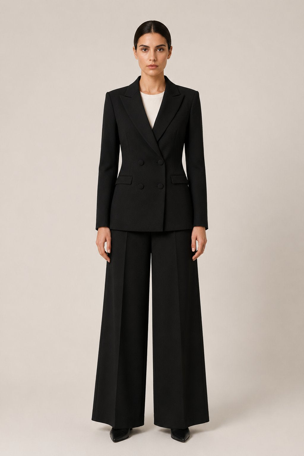 Pantalone palazzo drappeggiato nero con dettagli oro