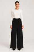 Pantalone palazzo drappeggiato nero con dettagli oro